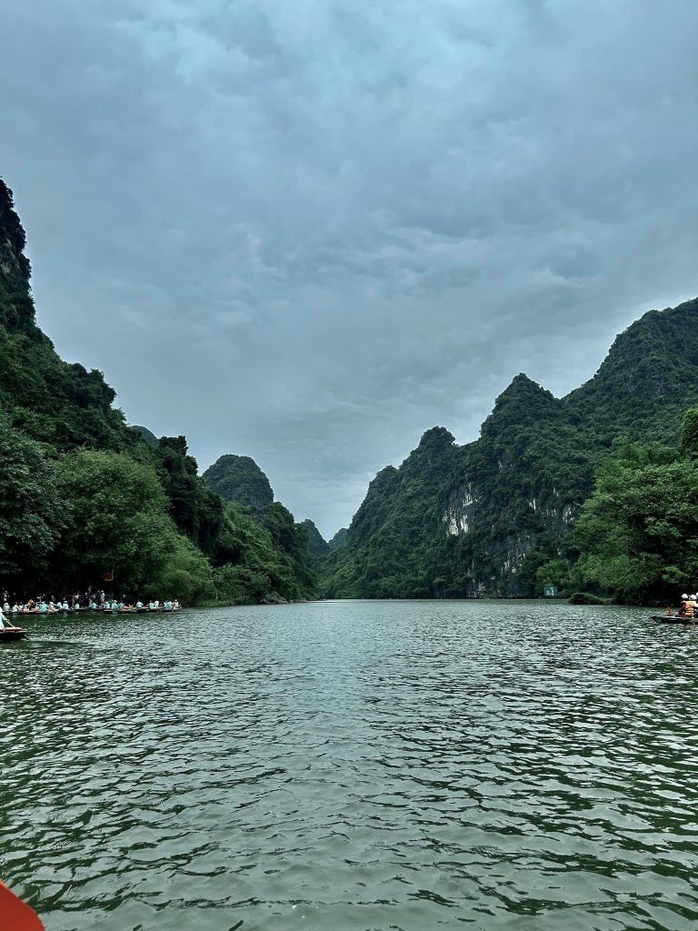Stunning Lan Ha Bay landscape featuring towering limestone karsts and tranquil waters, perfect for a.