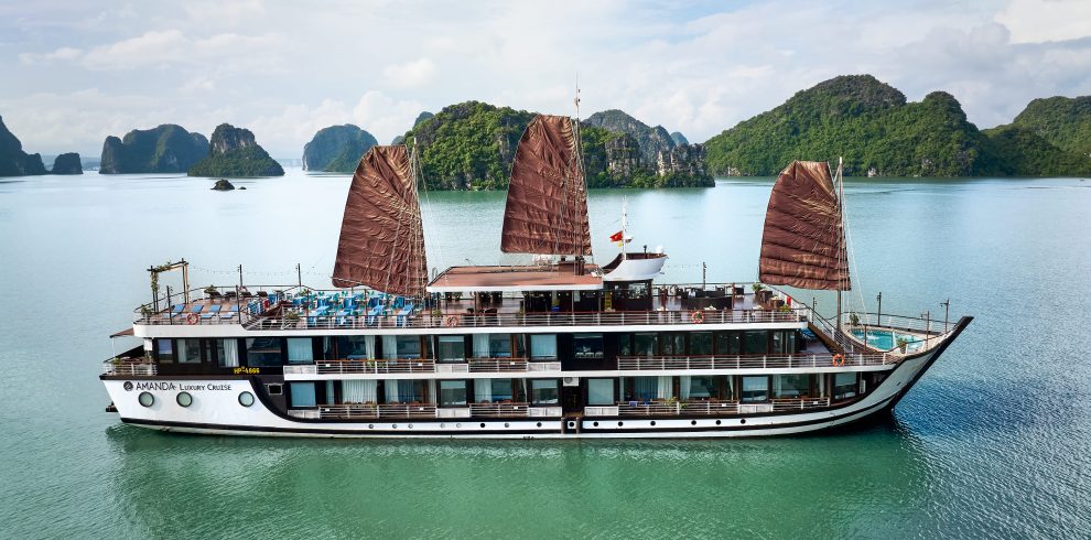 A luxurious Lan Ha Bay cruise showcasing stunning limestone karsts and tranquil waters.