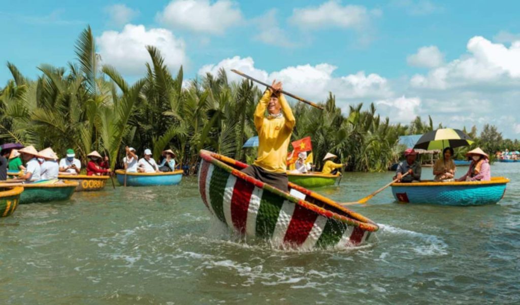 Vivid scene of kayaking through lush green waters surrounded by tropical foliage in Halong Bay, capt.