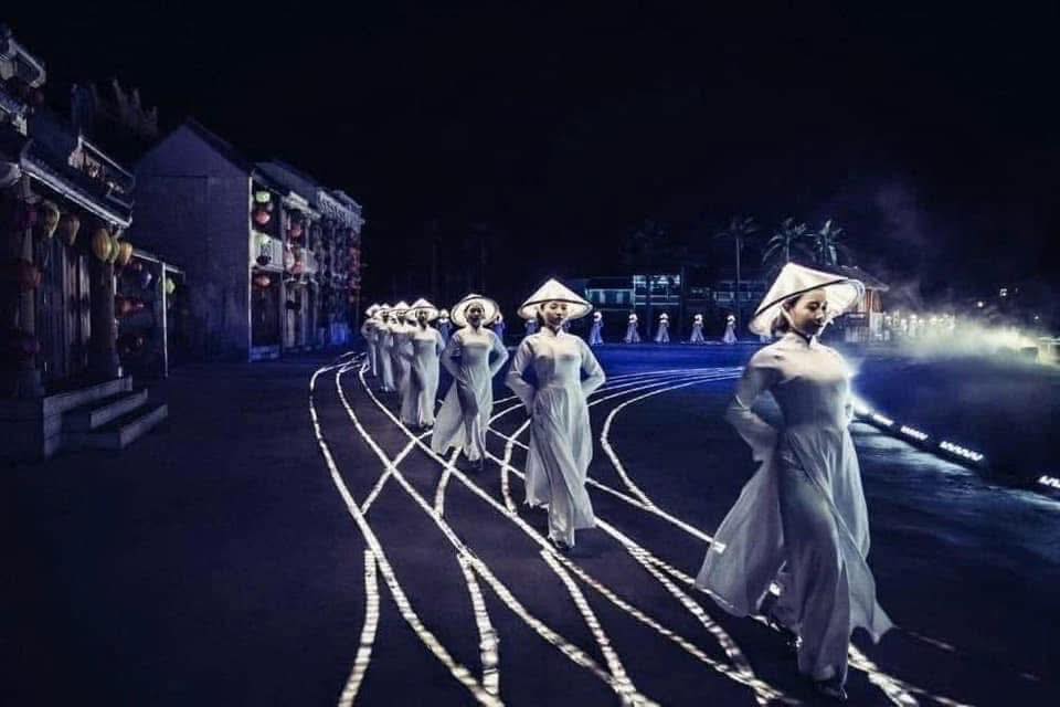 Night parade in Hue showcasing traditional costumes and cultural vibrancy.