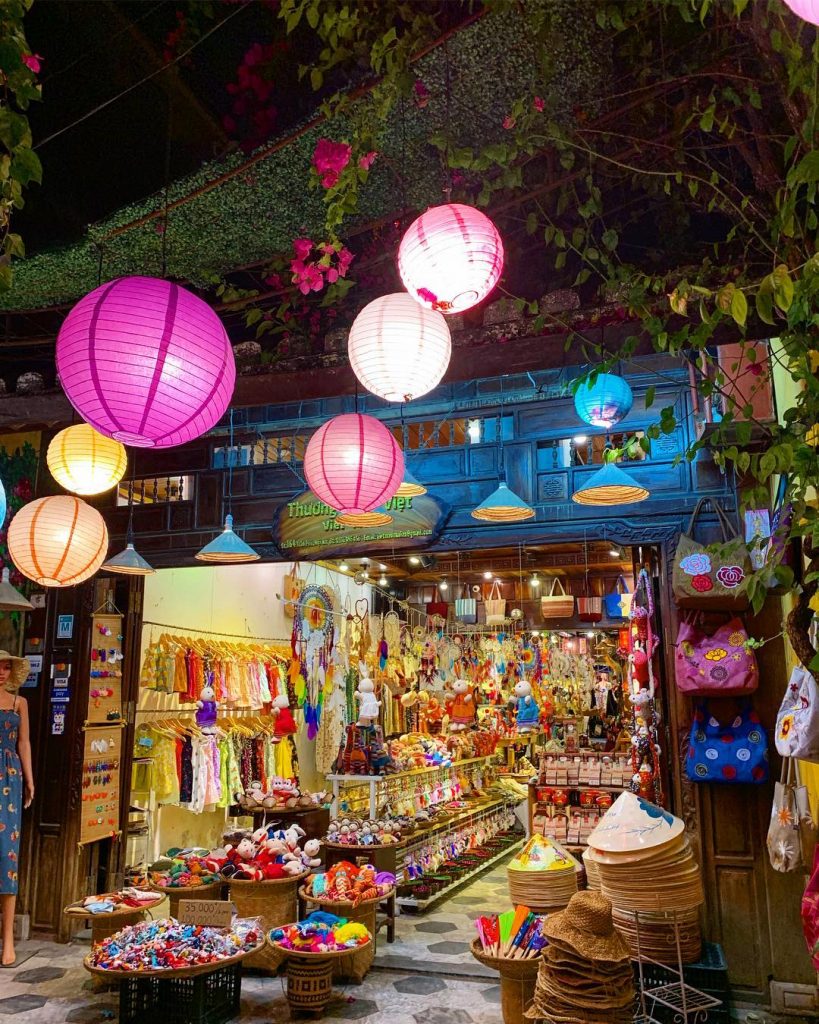 Vibrant night market in Vietnam with colorful lanterns, local crafts, and lively atmosphere perfect.