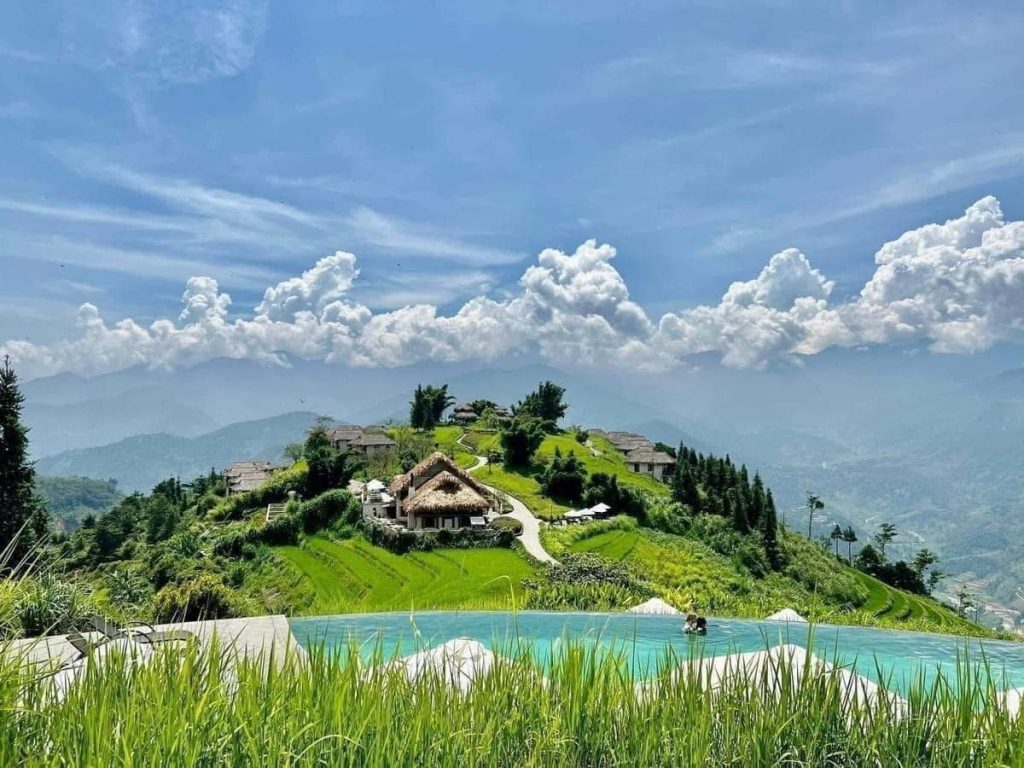 Stunning mountain landscape with lush greenery and traditional village views in Sapa.