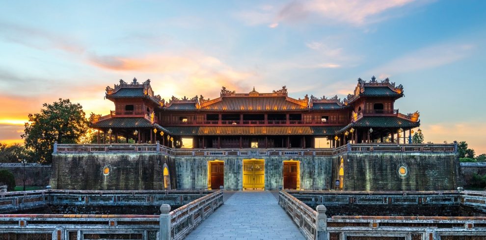 Majestic Hue Imperial Palace at sunset, showcasing traditional Vietnamese architecture and cultural.
