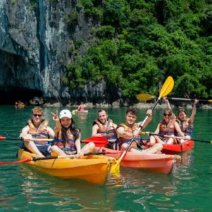 halong-bay-kayaking-smiling-travelers-viettrendtour Medium
