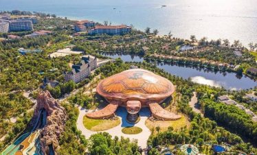 Aerial view of Turtle Island Resort in Halong Bay showcasing stunning natural beauty and luxurious a.
