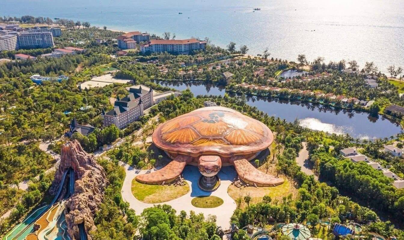 Aerial view of Turtle Island Resort in Halong Bay showcasing stunning natural beauty and luxurious a.