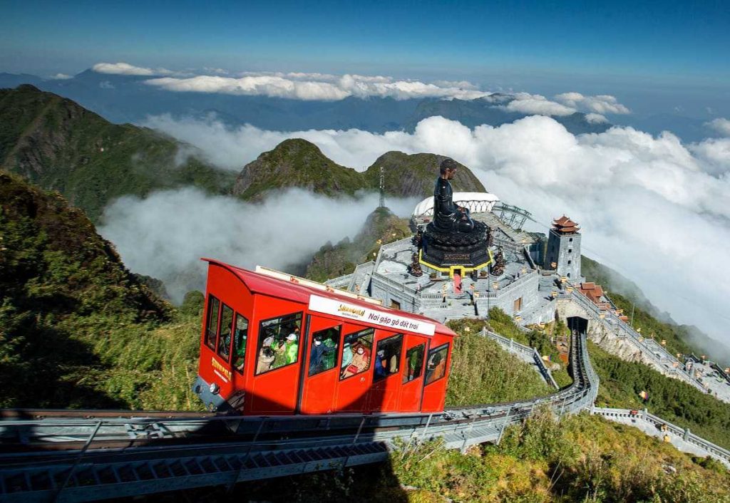 Cable car ride over lush mountains in Vietnam, offering breathtaking views and a sense of adventure.