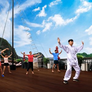 tai-chi-morning-exercise-sundeck-halong-bay-viettrendtour
