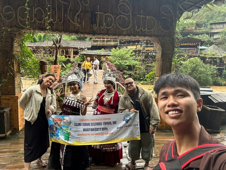 Vibrant cultural village scene with traditional costumes and smiling travelers exploring local herit.