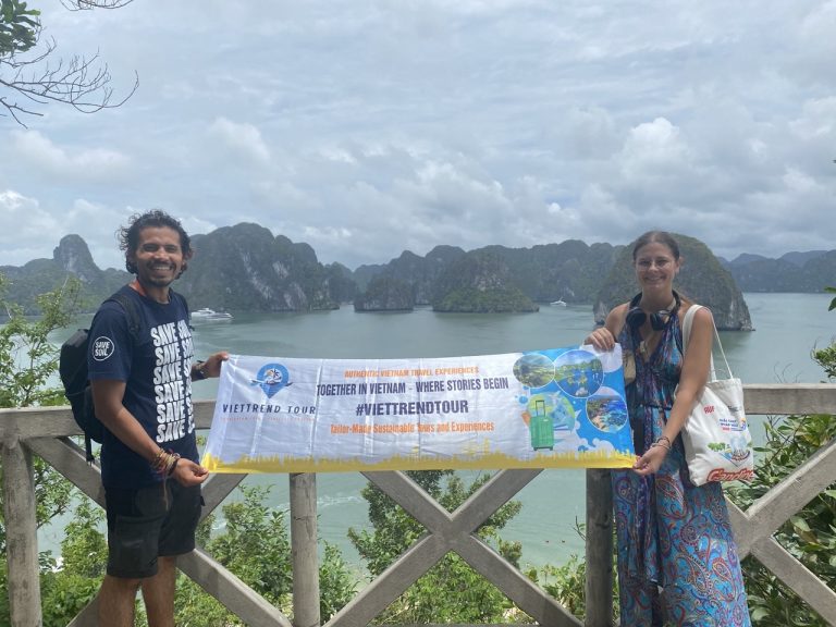 Stunning Halong Bay landscape with travelers enjoying a scenic cruise balcony experience.