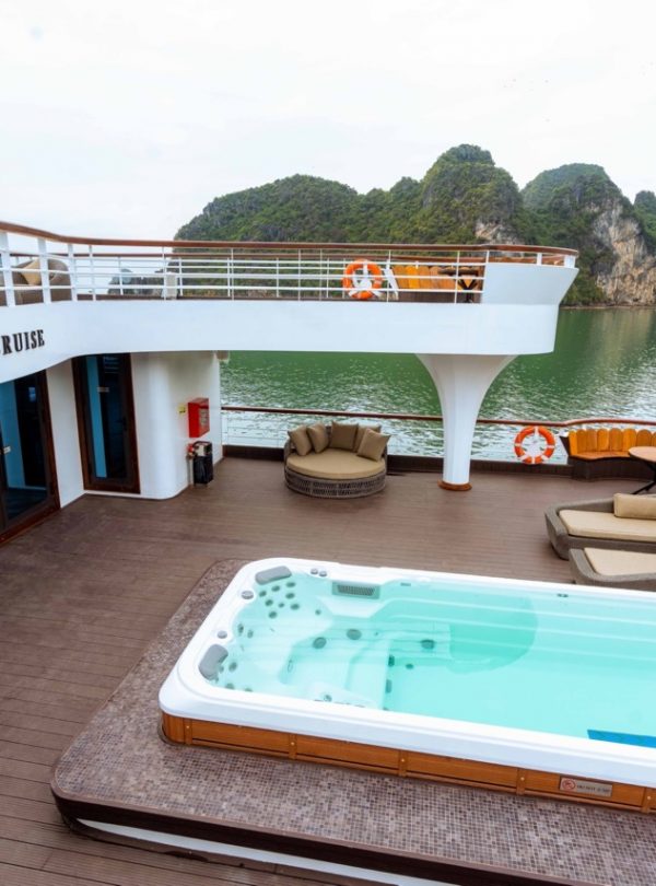 Relaxing cruise balcony with hot tub and seating on Halong Bay, Vietnam.