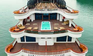 Luxury cruise balcony view in Halong Bay with relaxing atmosphere.