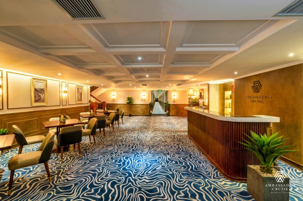Luxurious cruise lounge with comfortable seating and ambient lighting, perfect for relaxing during H.