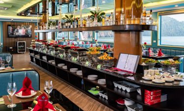 Relaxing Halong Bay cruise balcony with scenic views and luxurious amenities.