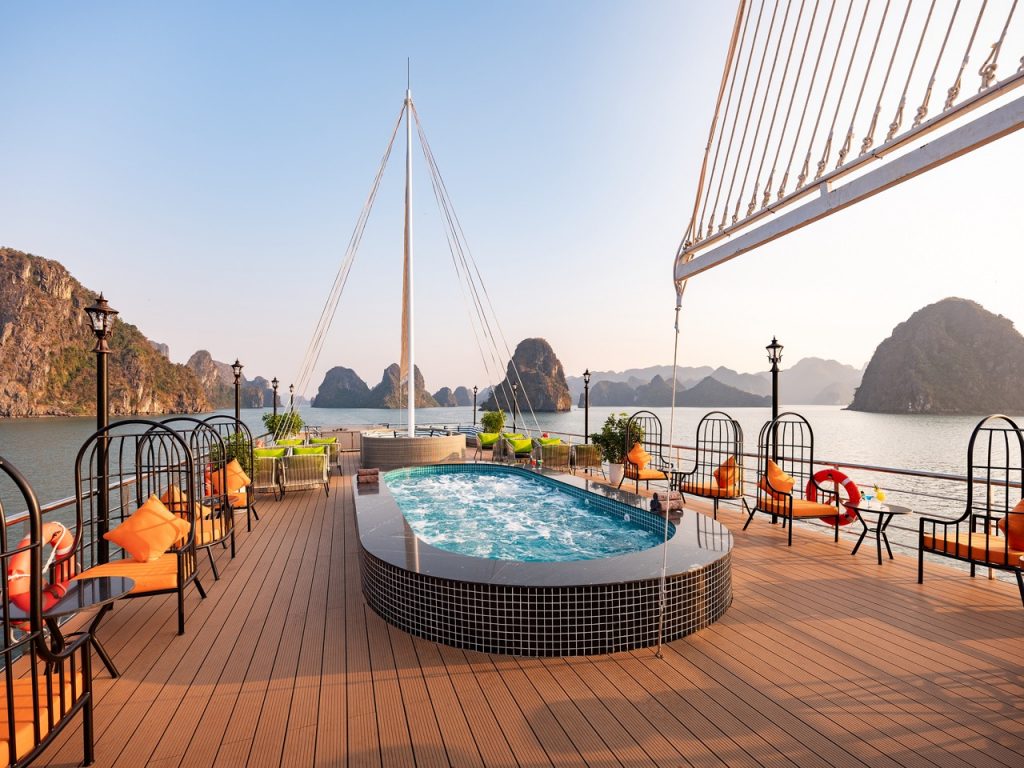 Halong Bay cruise balcony with scenic views and relaxing atmosphere.
