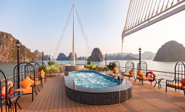 Halong Bay cruise balcony with scenic views and relaxing atmosphere.