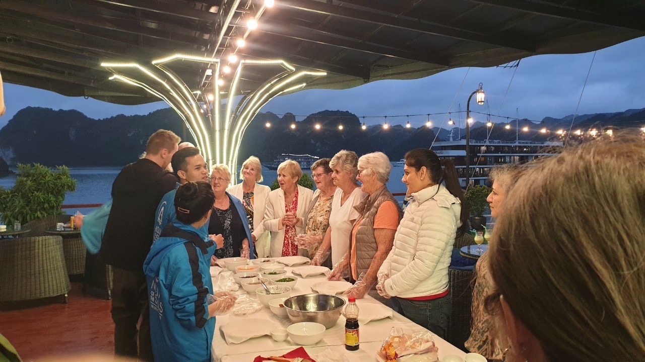 Enjoy a scenic Halong Bay cruise with a delicious dinner and friendly crew. Perfect for an unforgett.