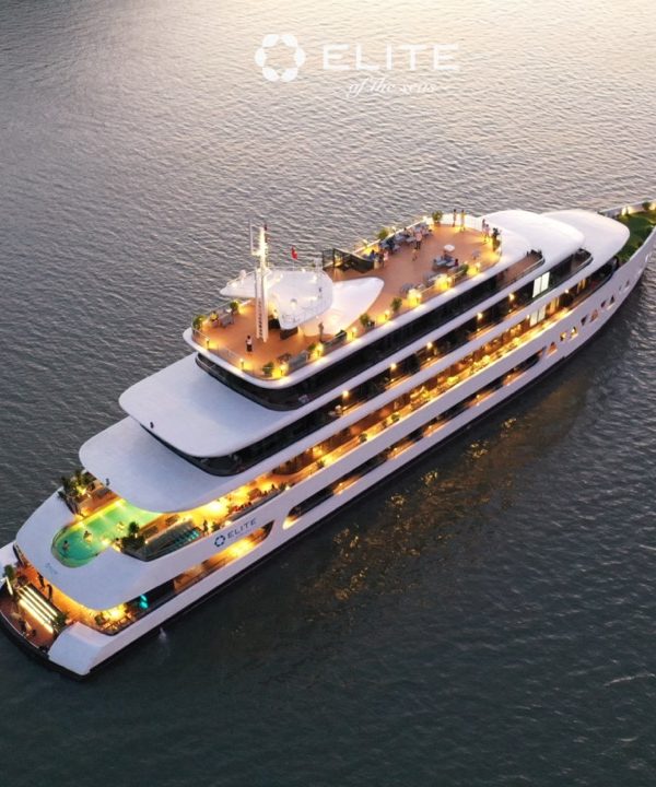 Luxury Halong Bay cruise with multiple decks and rooftop pool, perfect for exploring scenic waters.