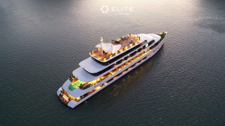 Luxury Halong Bay cruise with multiple decks and rooftop pool, perfect for exploring scenic waters.