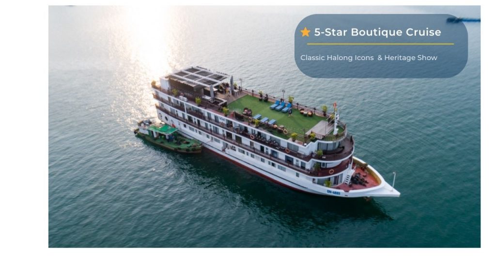 Luxury cruise ship in Halong Bay offering private tours and heritage shows.