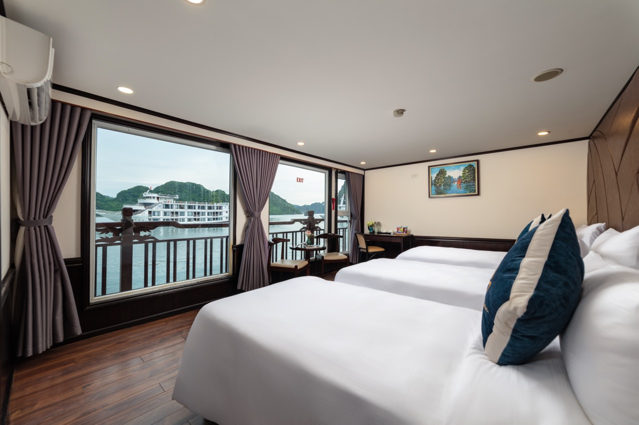 Comfortable hotel room with riverside view and modern amenities, perfect for leisure travel in Vietnam.