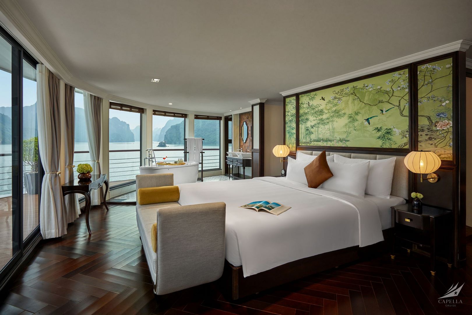 Elegant hotel room with ocean view and luxurious amenities in Ha Long Bay, Vietnam.
