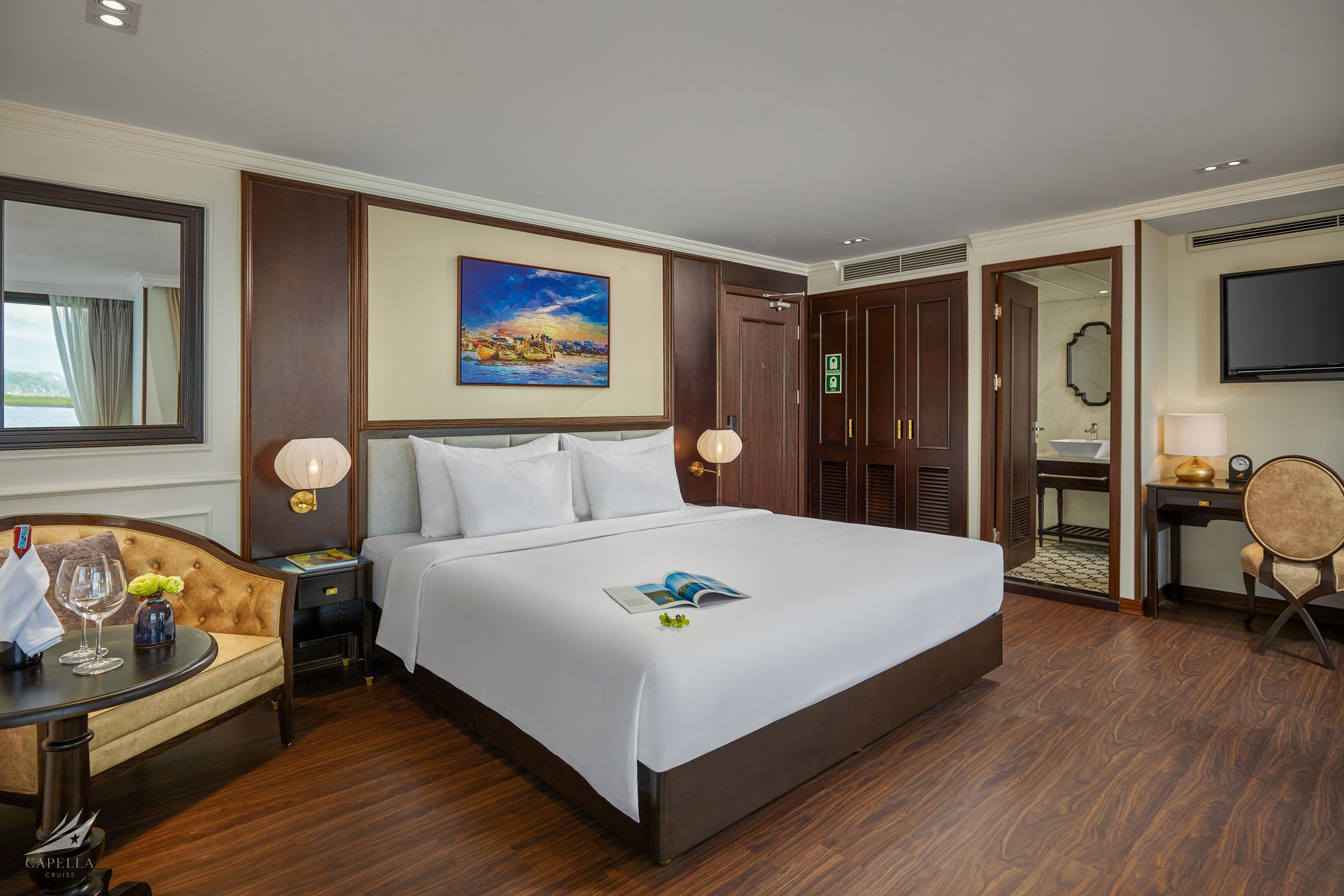 Luxurious hotel bedroom with elegant decor, comfortable king-sized bed, and modern amenities in Vietnam.