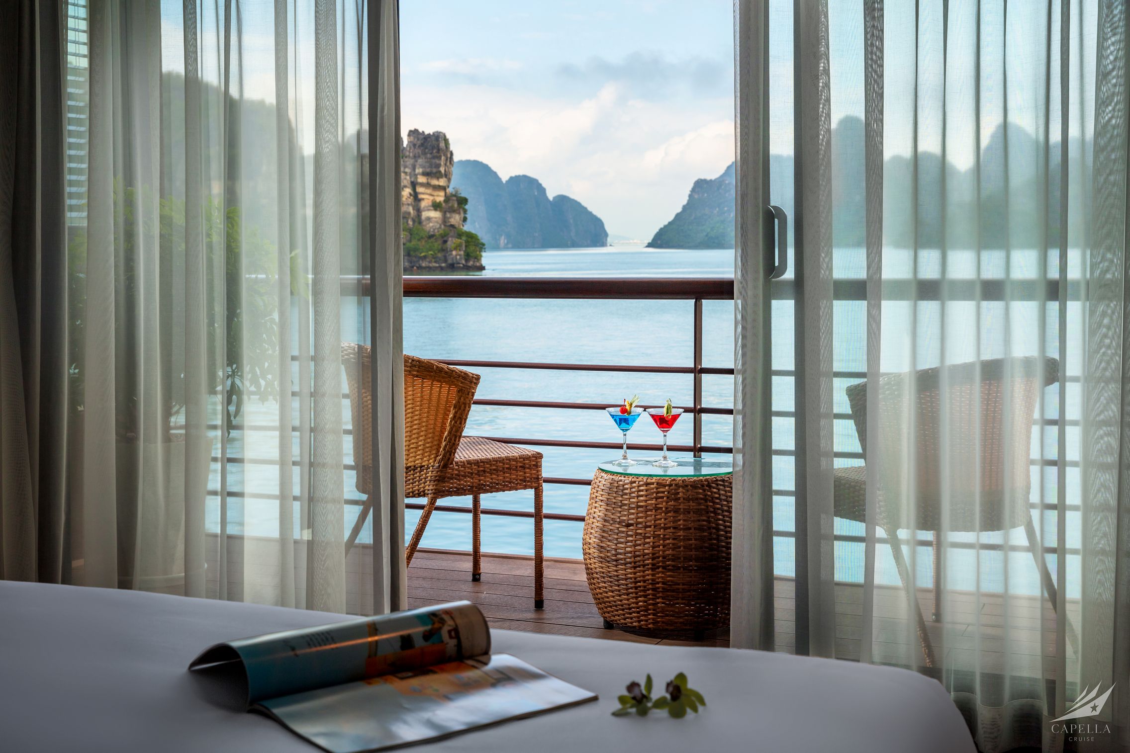 Breathtaking ocean view from a luxury resort balcony in Vietnam with tropical scenery.