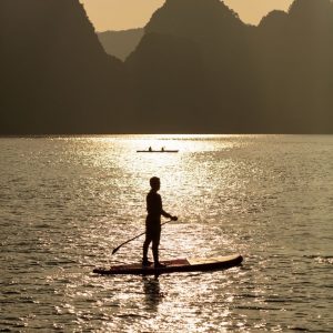 activity-standup-paddle-sunset-silhouette-capella-cruise-lan-ha-bay-viettrendtour