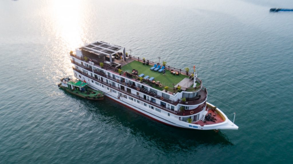 Luxurious cruise ship on calm waters in Vietnam.