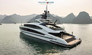 Elegant cruise balcony overlooking Halong Bay's limestone karsts, perfect for relaxing and sightseei.