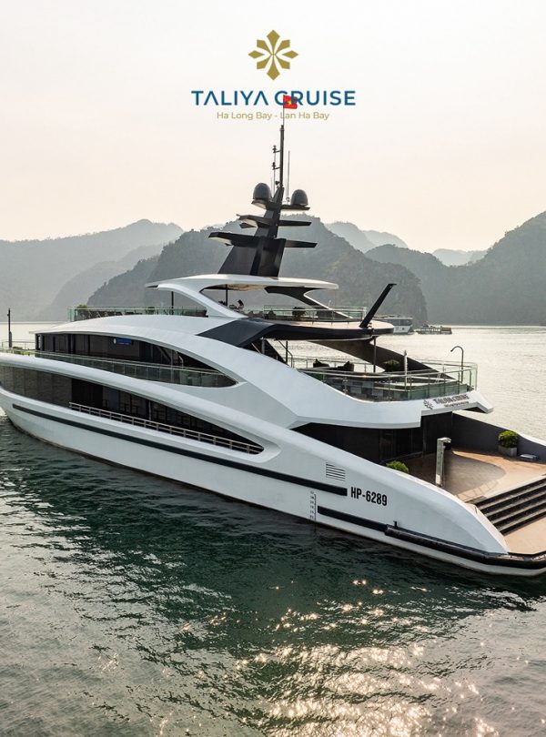 Elegant cruise balcony overlooking Halong Bay's limestone karsts, perfect for relaxing and sightseei.