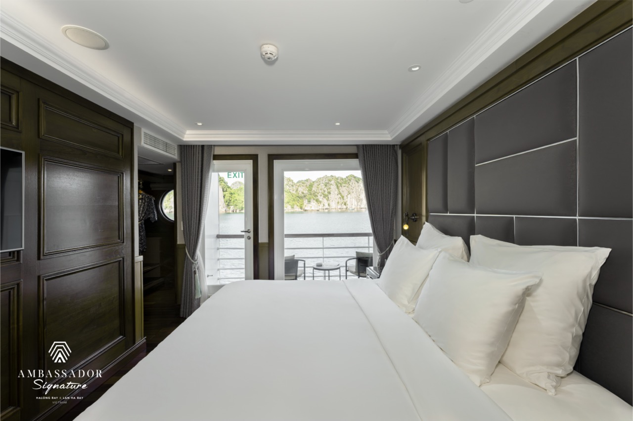 Halong Bay cruise balcony with stunning water views and elegant interior design.