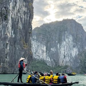 1. boat tour exploring Halong Bay with limestone karsts and lush islands.