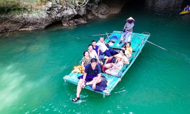 Lan Ha Bay kayaking adventure with tourists enjoying scenic views and turquoise waters.