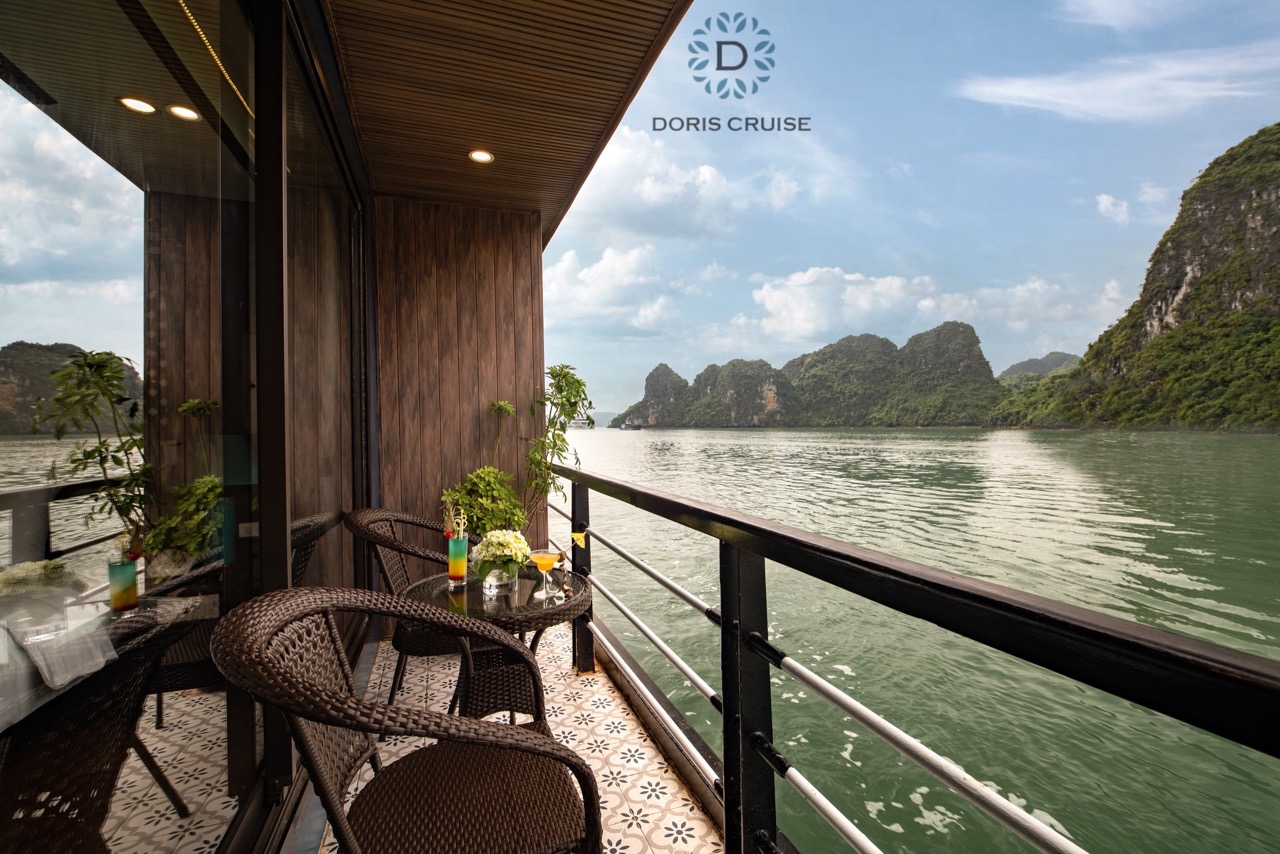 Stunning view from the balcony of Doris Cruise in Halong Bay, perfect for relaxing and enjoying the.