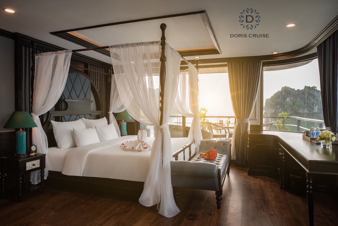 Elegant cruise balcony view of Halong Bay with sunrise, perfect for romantic getaways and scenic exp.