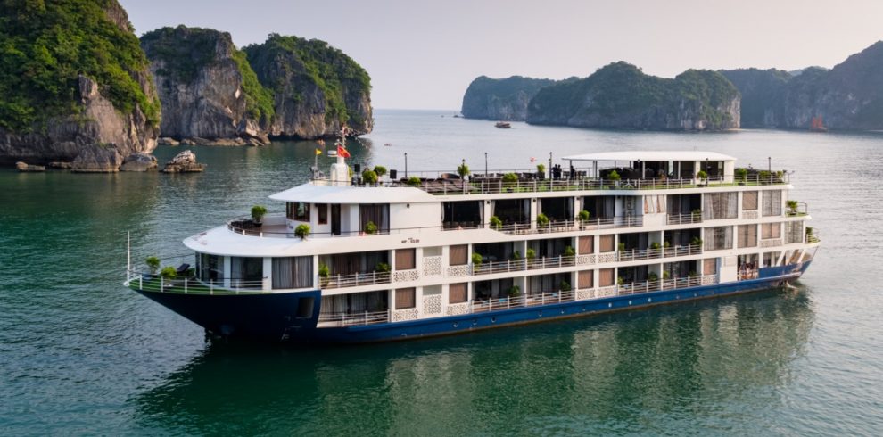 MonCheri Cruise - Elegant cruise ship sailing through stunning Halong Bay scenery, perfect for a 2D1N tour.