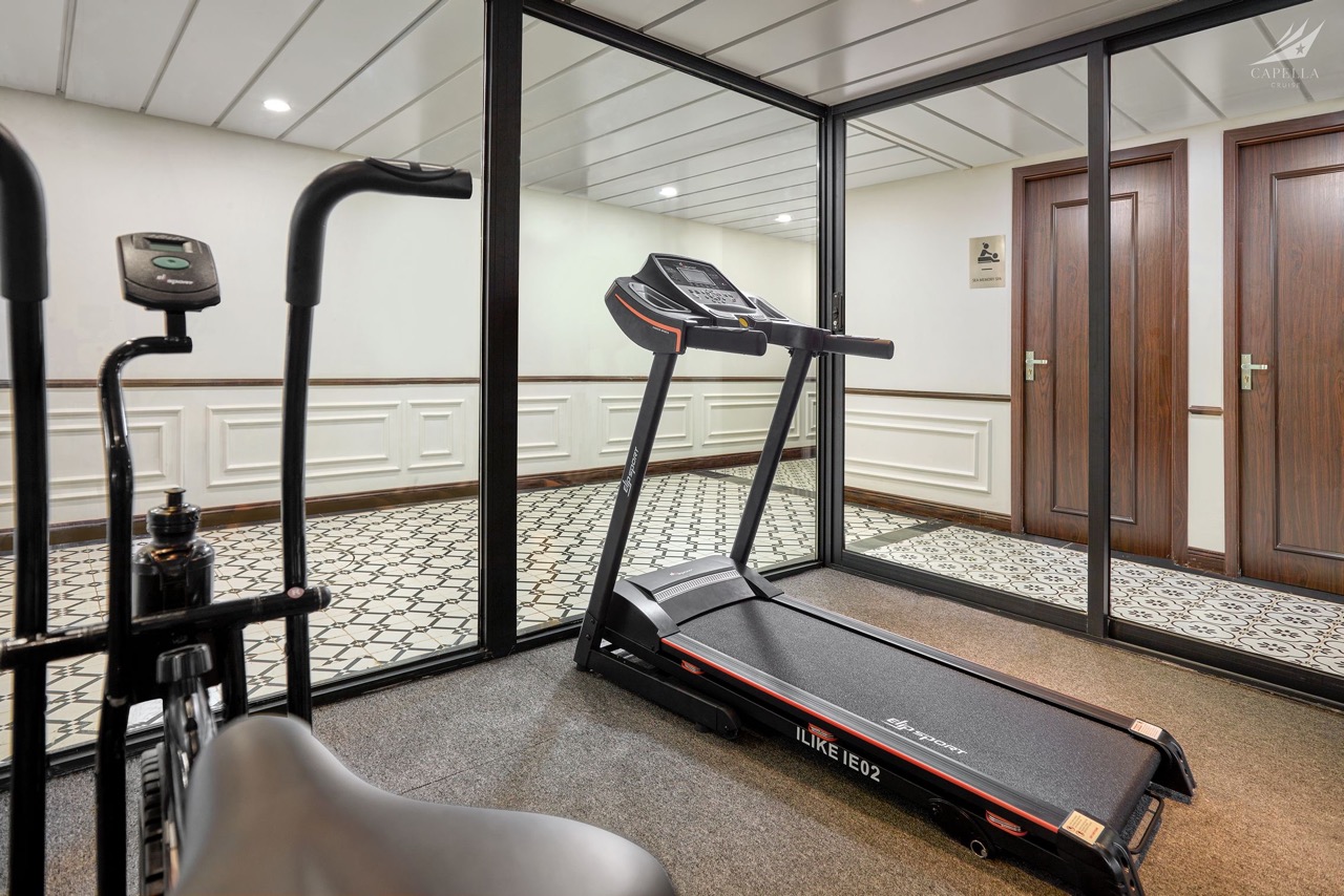 Modern treadmill in hotel gym for fitness and wellness.