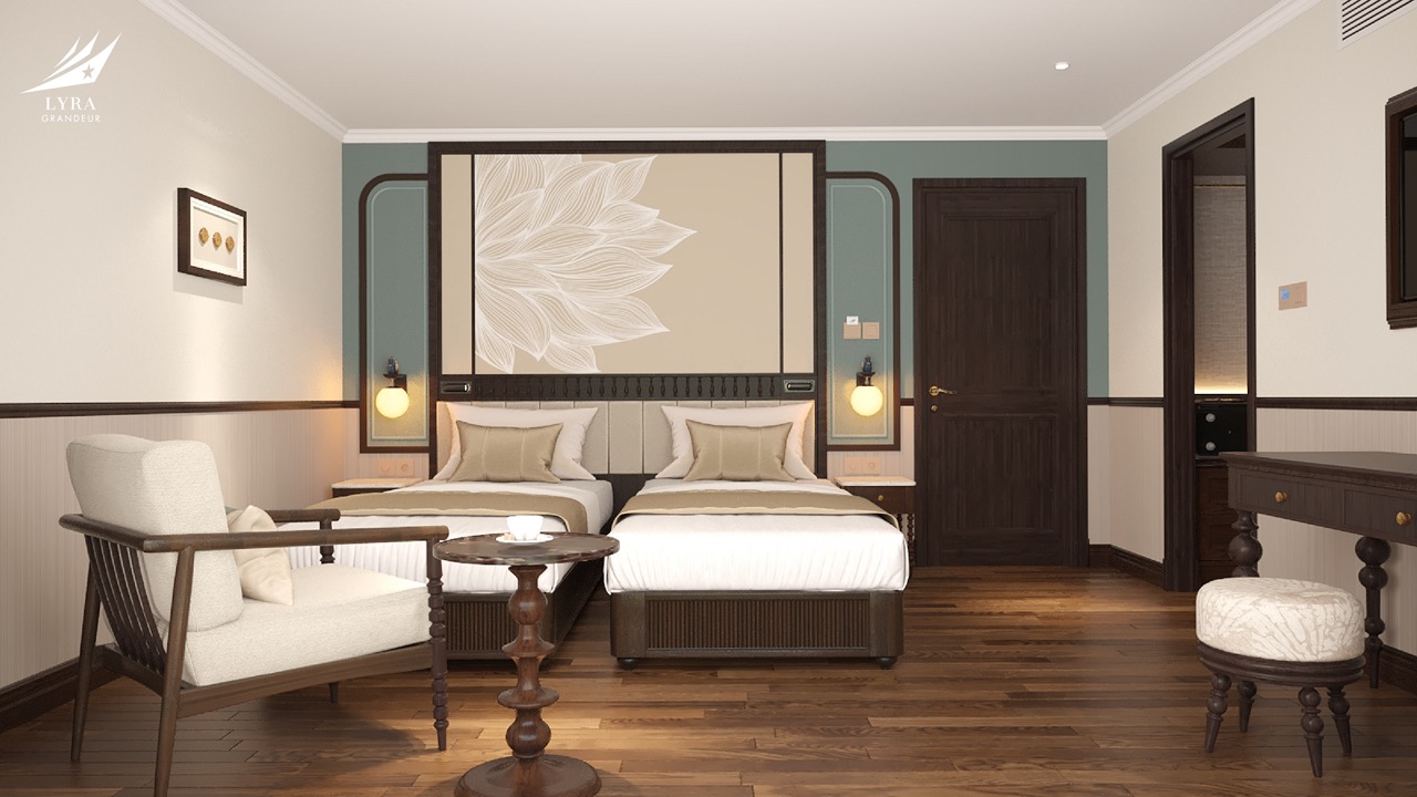 Elegant hotel room with twin beds, modern decor, and cozy seating area at ViettrendTour.