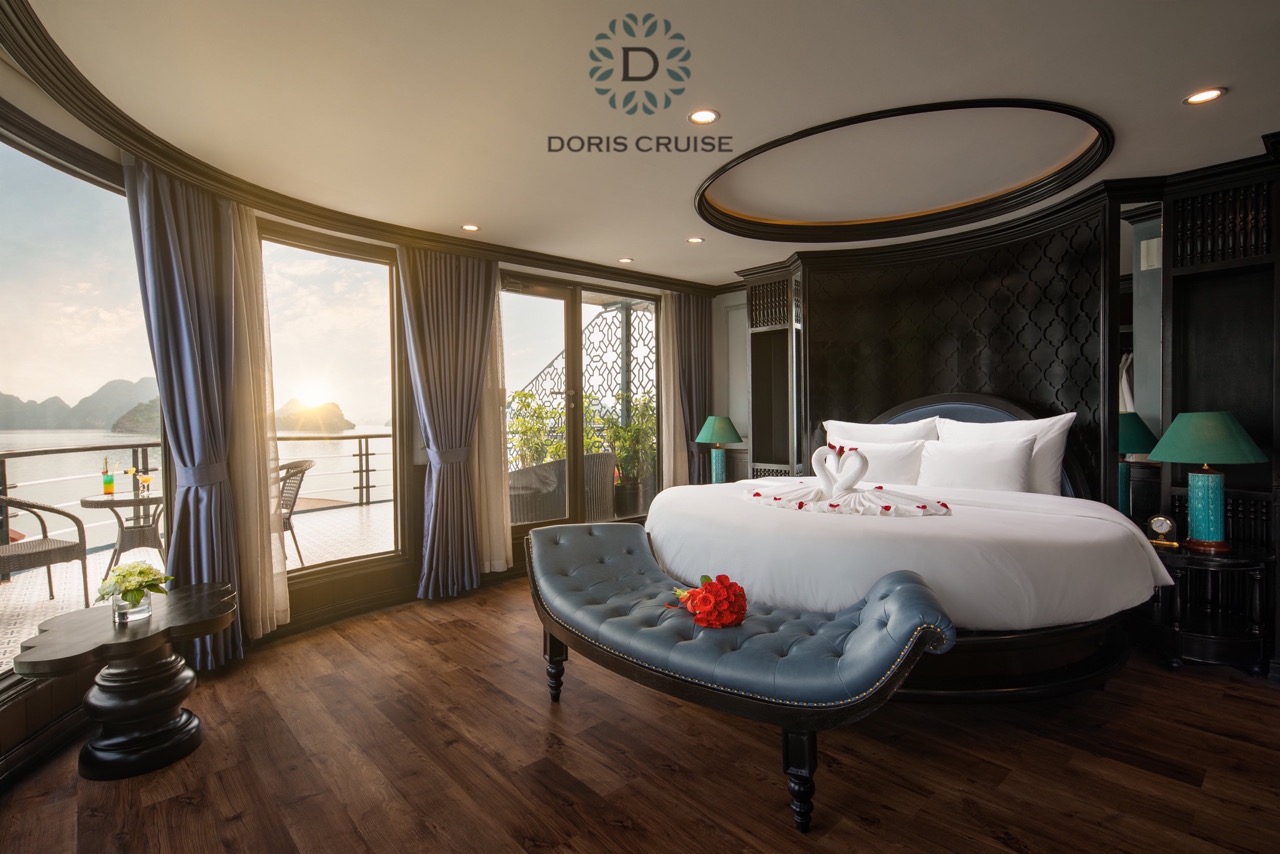 Elegant cruise balcony view of Halong Bay with stunning sunset scenery and tranquil waters.
