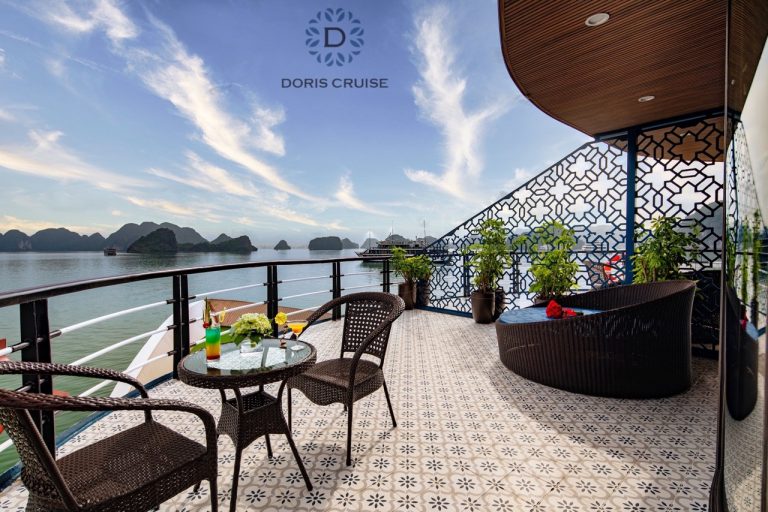 Stunning view from the balcony of Doris Cruise in Halong Bay, perfect for relaxing and enjoying scen.