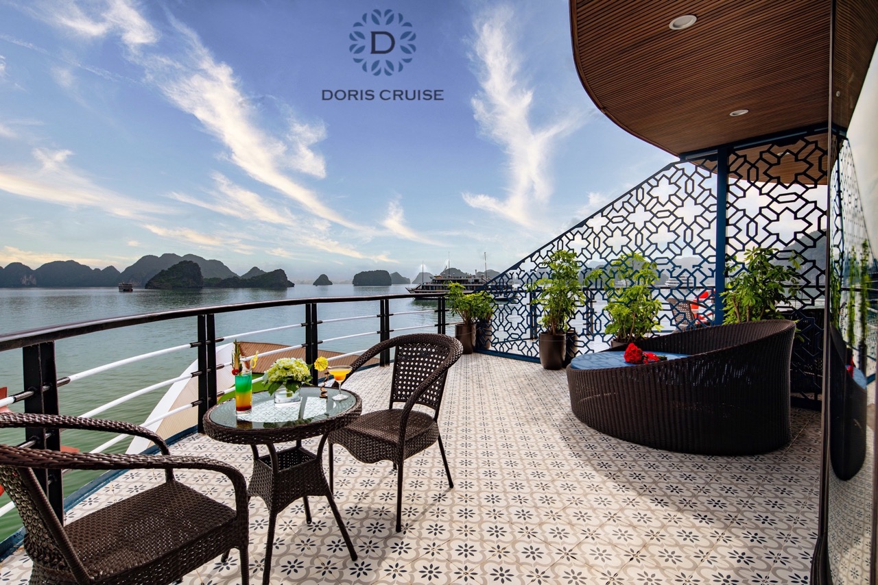 Stunning view from the balcony of Doris Cruise in Halong Bay, perfect for relaxing and enjoying scen.