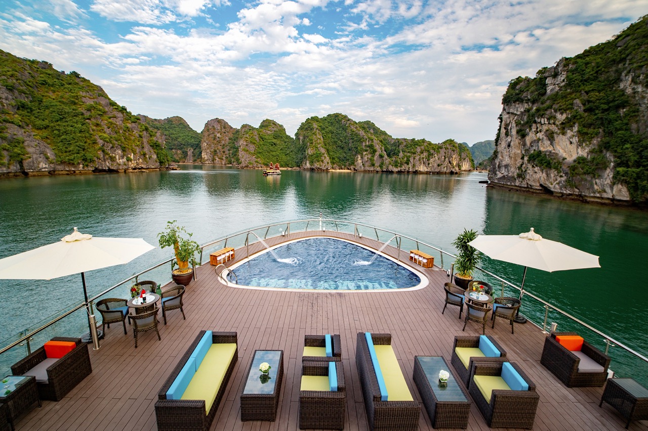 Relaxing cruise in Ha Long Bay with private pool and scenic limestone islands.