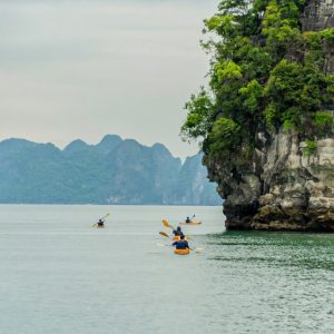 kayaking-group-island-channel-grand-pioneers-cruise-halong-bay-viettrendtour