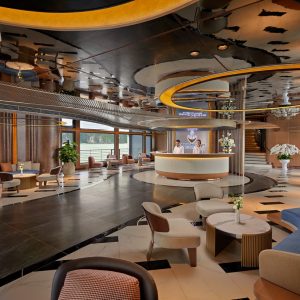 Modern luxury hotel lobby with stylish seating and elegant decor for upscale travel experience.