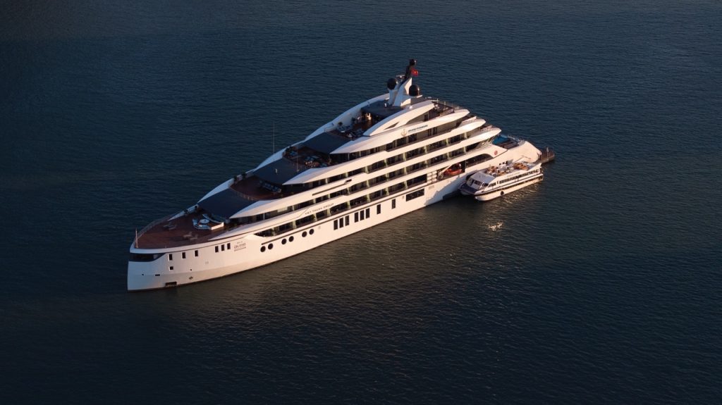 Luxury yacht cruising in Halong Bay, Vietnam, perfect for private cruises and tours.