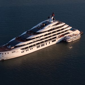 luxury-yacht-side-profile-aerial-grand-pioneers-cruise-halong-bay-viettrendtour