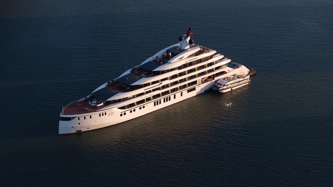 Luxury yacht cruising in Halong Bay, Vietnam, perfect for private cruises and tours.