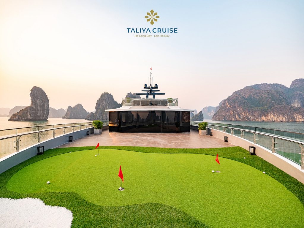 Stunning view from the cruise balcony over Halong Bay's emerald waters and limestone karsts.
